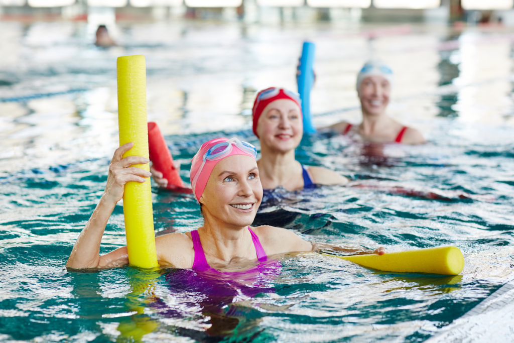 marietta-senior-living-women with pool noodles